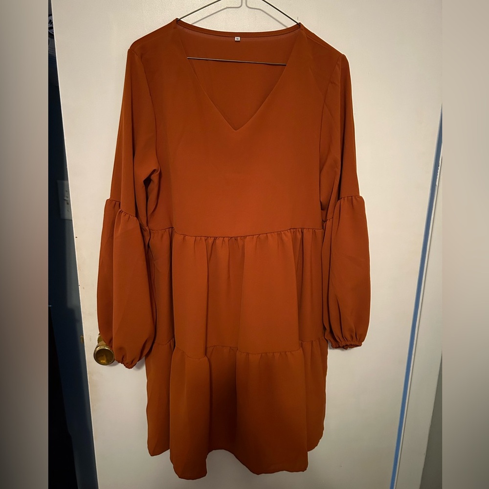 Boutique dress. Size Medium. Above the knee in length.